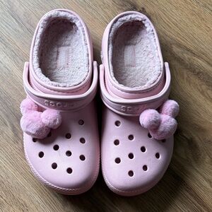 CROCS Light Pink Clogs with Plush Pom Poms
